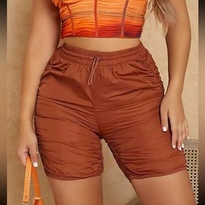 Minimum stretch, with drawstring waist. Semi- Sheer, 100% Polyamide.